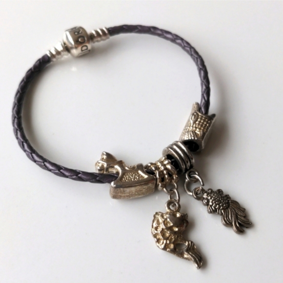 Pandora Jewelry - Pandora 7" woven rope leather bracelet with four animal charms